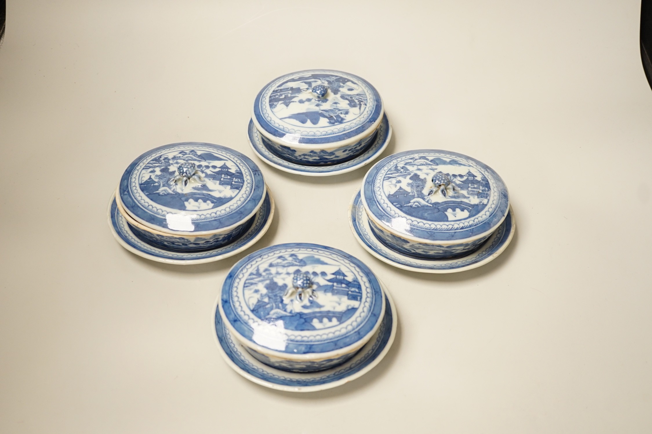 A set of four Chinese Export sauce tureens on stands, early 19th century. 7.5cm tall